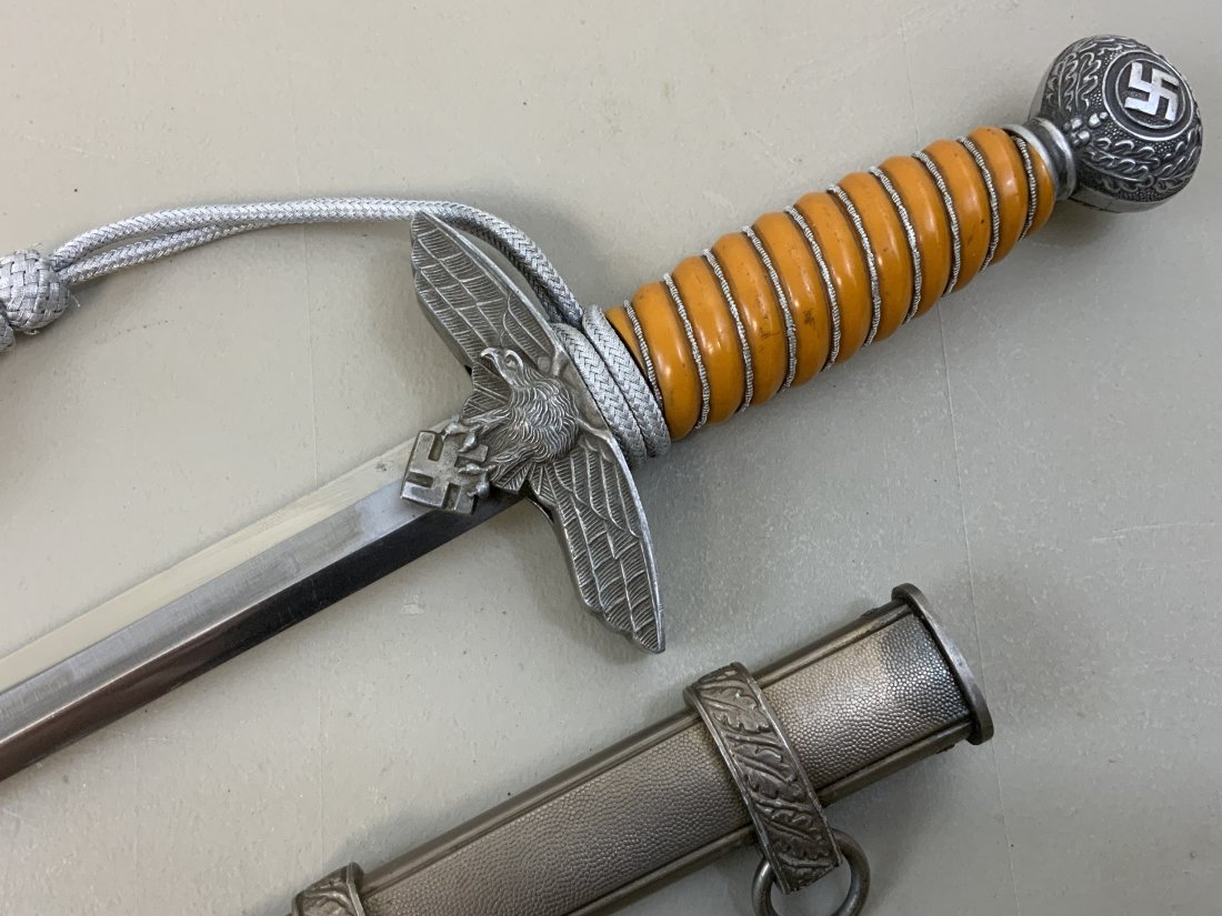 WWII GERMAN LUFTWAFFE OFFICERS DAGGER - WKC: WWII GERMAN LUFTWAFFE OFFICERS DAGGER - WKC . GREAT NEAR MINT CONDITION LUFTWAFFE 2nd MODEL OFFICERS DAGGER WITH YELLOW GRIP . MADE BY WKC SOLINGEN. SUPER NICE AND CLEAN CONDITION OVERALL. .
