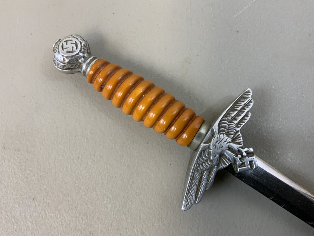WWII GERMAN LUFTWAFFE OFFICERS MINIATURE DAGGER - SMF: WWII GERMAN LUFTWAFFE OFFICERS MINIATURE DAGGER - SMF. RARE HIGH QUALITY MADE BY SMF SOLINGEN. INSCRIPTION ON THE BLADE "JUNE 6th 1945 SOLINGEN GERMANY . MOST LIKELY A GIFT TO AMERICAN GI . ALUMINUM F