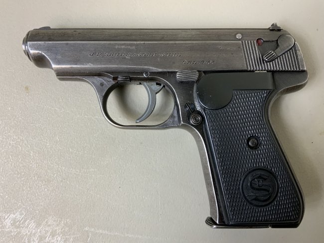 WWII NAZI GERMAN SAUER H38 PISTOL WITH HOLSTER: WWII NAZI GERMAN SAUER H38 PISTOL WITH HOLSTER .GREAT GUN BY J.P.SAUER & SOHN. MILITARY ISSUES AS STAMPED WITH NAZI GERMAN WAFFENAMP EAGLE OVER 37 . ALL ORIGINAL GUN WITH ORIGINAL MAGAZINE AND ITS ORI
