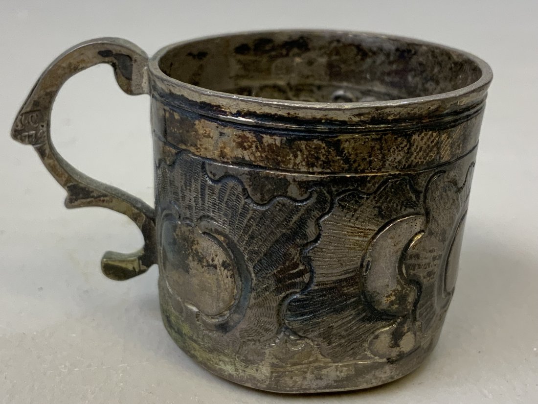 ANTIQUE IMPERIAL RUSSIAN 18th C. SILVER WINE CUP & COIN: ANTIQUE IMPERIAL RUSSIAN 18th CENTURY SILVER WINE TASTER CUP WITH COPPER COIN AT THE BASE. 1774 HALLMARKED. 1 3/8 DIAMETER AND 1 3/8 TALL. EX MORTON AND EDEN LONDON , JUNE11-13 2008 AUCTION , LOT 1524
