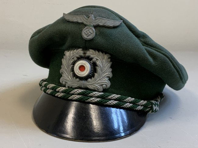 WWII GERMAN ZOLL CUSTOMS OFFICIAL VISOR HAT CAP: WWII GERMAN ZOLL CUSTOMS OFFICIAL VISOR HAT CAP . NICE GREAT CHARACTER CAP . WELL WORN. HIGH SADDLE SHAPE. NICE TO DISPLAY. DIRT AND WEAR BUT STILL LOOKS GREAT .