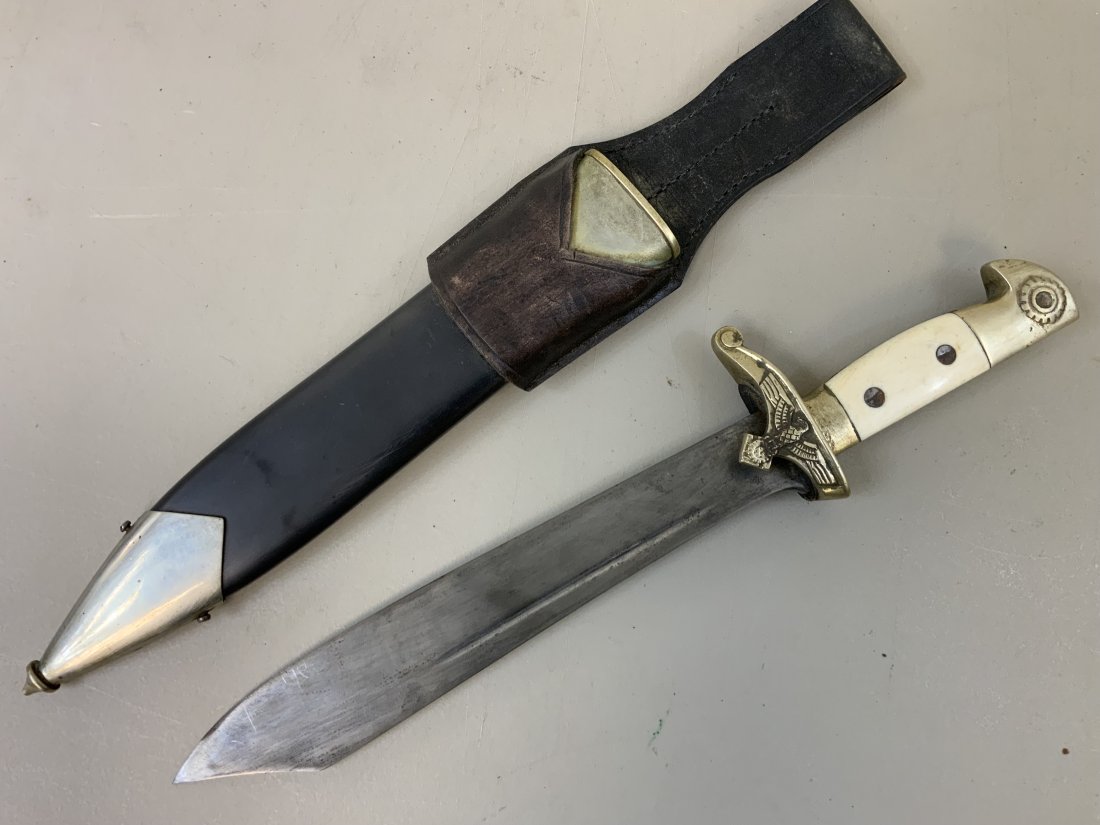 WWII GERMAN TENO HEWER DAGGER - CARL EICKHORN: WWII GERMAN TENO HEWER DAGGER BY CARL EICKHORN . OLD REPRODUCTION . BLADE IS NICE EICKHORN MARKED . LEATHER CARRY FROG. LOOKS GREAT WITH WEAR AND AGE. NICE FILLER FOR THIS RARE PIECE.