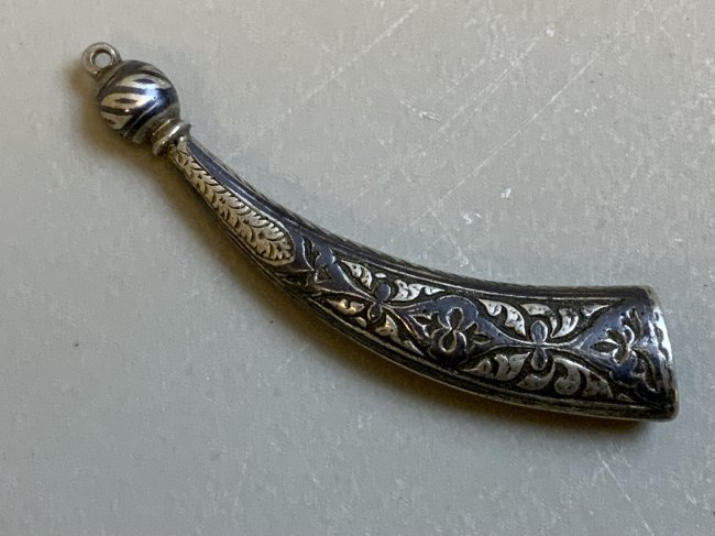 ANTIQUE RUSSIAN CAUCASIAN COSSACK DAGGER AND BELT PARTS: ANTIQUE RUSSIAN CAUCASIAN COSSACK DAGGER AND BELT PARTS. SILVER DAGGER TIP AND BELT DETAILS