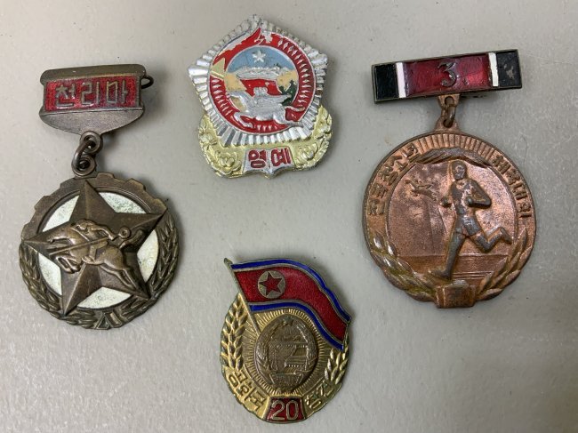 NORTH KOREA SET OF 4 MEDALS: NORTH KOREA SET OF 4 MEDALS . RARE