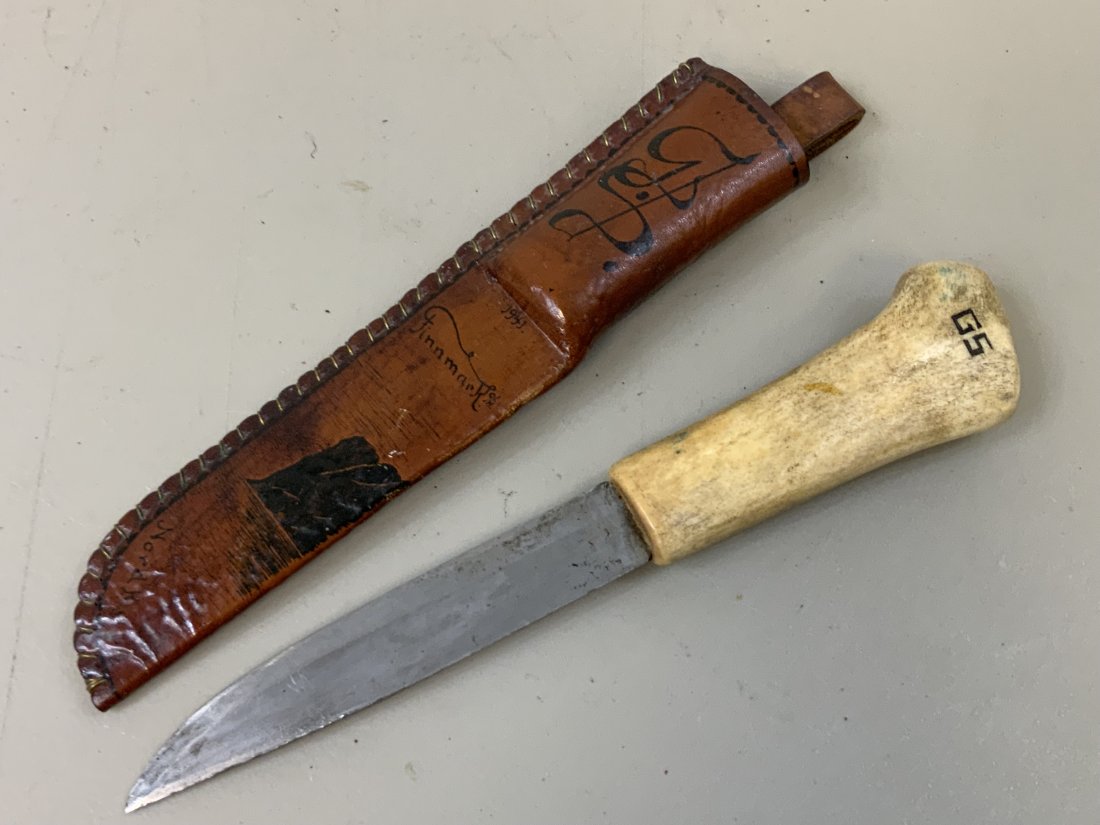 WWII FINISH KNIFE SWEDISH MADE BLADE ERIK FROST MORA 1941 DATED: WWII FINISH KNIFE SWEDISH MADE BLADE ERIK FROST MORA 1941 DATED. ANTLER HANDLE. LEATHER SHEET MARKED WITH INITIALS "G S " 1941 "FINNMARK" " NORDKAPP" AND "SUNNAR SKOMEDAL" ON THE OTHER SIDE . 10" LONG