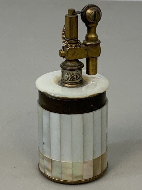 ANTIQUE TIFFANY & CO. FRANCE MOTHER OF PEARL LIGHTER: ANTIQUE ART DECO TIFFANY & CO. FRANCE MOTHER OF PEARL LIGHTER. RARE. 3 3/4 tall 1.5" diam.