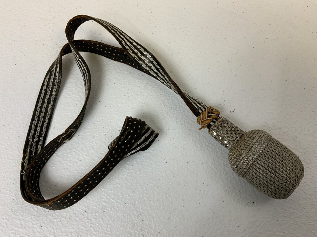 WWII GERMAN BAYONET SWORD KNOT PORTEPEE: WWII GERMAN BAYONET SWORD KNOT PORTEPEE. WELL USED CONDITION .