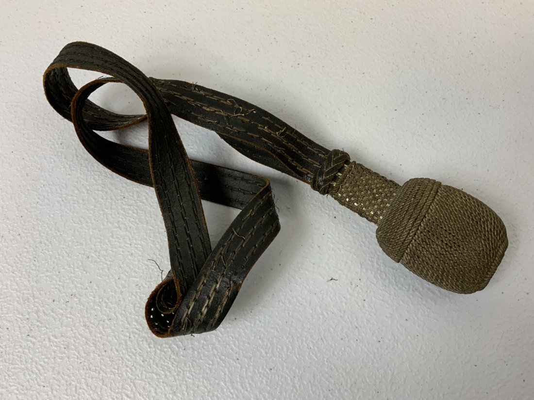 WWII GERMAN BAYONET SWORD KNOT PORTEPEE: WWII GERMAN BAYONET SWORD KNOT PORTEPEE. WELL USED CONDITION .