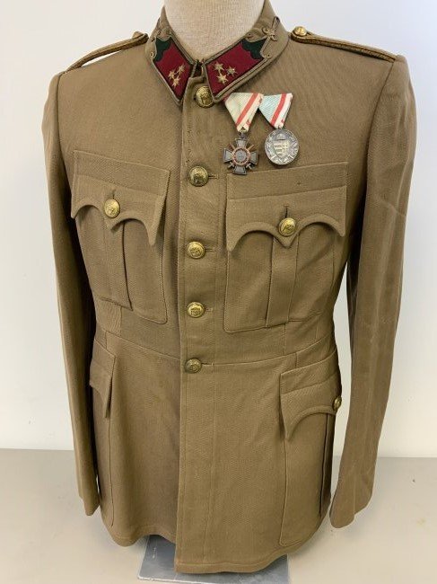 WWII HUNGARIAN OFFICER UNIFORM TUNIC - GERMAN ALLY: WWII HUNGARIAN OFFICER UNIFORM TUNIC - GERMAN ALLY. RARE FIND! GREAT CONDITION AND LARGE SIZE OFFICER TUNIC. COMPLETE WITH HUNGARIAN MEDALS . GREAT CONDITION AND BUDAPEST TAYLOR LABEL INSIDE.