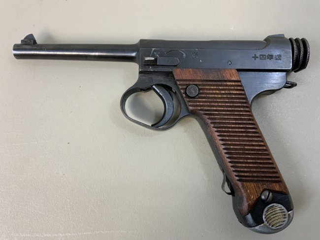 WWII IMPERIAL JAPANESE TYPE 14 NAMBU PISTOL 1943: World War II Japanese Type 14 Nambu Pistol, made in November of 1943 (18.11 stamp) at the Nagoya Arsenal . This pistol is a fantastic original example of what a Japanese soldier would have used during