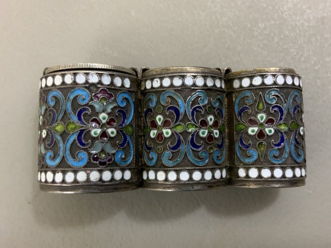 ANTIQUE IMPERIAL RUSSIAN 94 SILVER ENAMEL COIN BANK: ANTIQUE IMPERIAL RUSSIAN 94 SILVER AND MULTI COLOR ENAMEL INLAID COIN BANK HOLDER . BEAUTIFUL CONDITION WITH SOME IMPERIAL RUSSIAN SILVER COINS . HALLMARKED .2 1/2 " LONG.