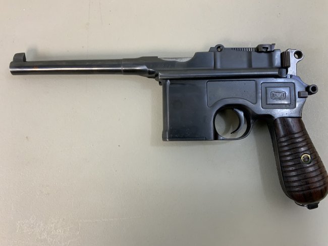 GERMAN BOOMHANDLE MAUSER C96 1930 COMMERCIAL PISTOL: GERMAN MAUSER C96 1930 COMMERCIAL PISTOL . THIS ONE IS IN GREAT NEAR MIN CONDITION. THIS 7.63 CALIBER BROOMHANDLE MAUSER WAS MADE BETWEEN 1932-1934. FINISH IS ABOUT 95%. GREAT CONDITION WOODEN GRIPS.