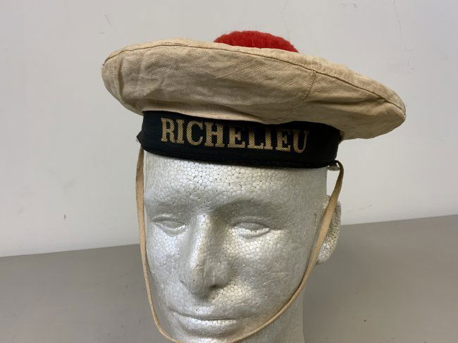 WWII FRENCH DONALD DUCK STYLE SAILOR CAP "Richelieu": WWII FRENCH DONALD DUCK STYLE SAILOR CAP WITH "Richelieu" CAP TALLY . SAILOR FROM FRENCH BATTLESHIP "RICHELIEU" . BLUE CAP WITH WHITE CAP COVER. GREAT CONDITION FOR ITS AGE. RARE FIND.