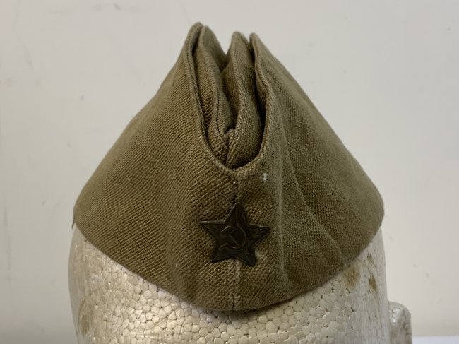 WWII STYLE SOVIET RUSSIAN PILOTKA HAT CAP WITH FIELD GREEN STAR.: WWII STYLE SOVIET RUSSIAN PILOTKA HAT CAP . FIELD GREEN STAR. GOOD WORN CONDITION . SIZE 54 . DATES AROUND 1970'S . NAMED INSIDE