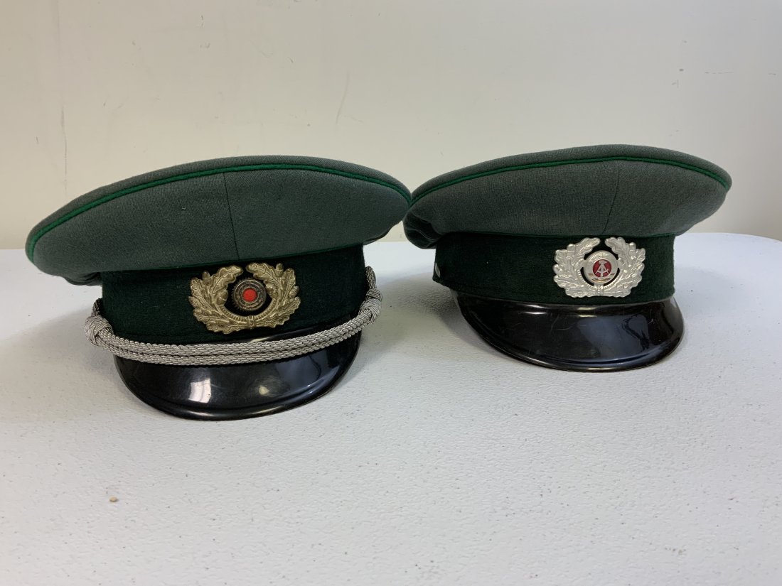 EAST GERMANY DDR POLICE LOT OF VISOR CAPS HATS: EAST GERMANY DDR POLICE LOT OF VISOR CAPS HATS . GREAT CONDITION . ONE HAS THIRD REICH WREATH AND COCKADE .