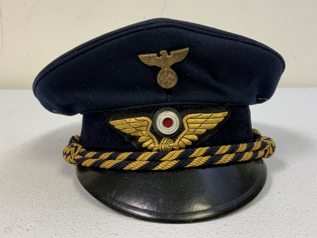 GERMANY THIRD REICH RAILWAY OFFICIAL REICHSBAHN VISOR HAT CAP: GERMANY THIRD REICH RAILWAY OFFICIAL REICHSBAHN VISOR HAT CAP. GOOD CONDITION FOR ITS AGE WITH NORMAL WEAR AND SOME HOLES ON TOP . SIZE ABOUT 57 . THESE ARE GETTING SCARCE AND HARD TO FIND. GOOD EXAMP