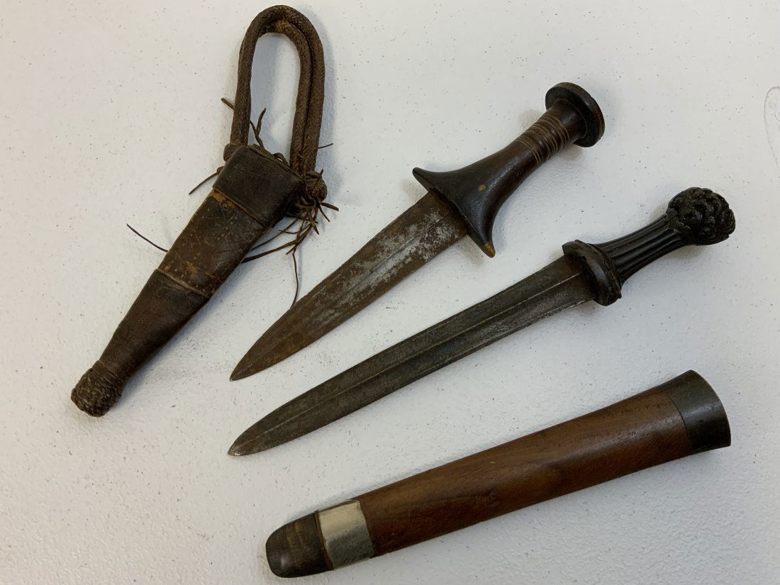 ANTIQUE NORTH AFRICAN STYLE DAGGERS LOT OF 2: ANTIQUE NORTH AFRICAN STYLE DAGGERS LOT OF 2 . BOTH DISPLAY GREAT AGE WITH NICE OLD BLADES .