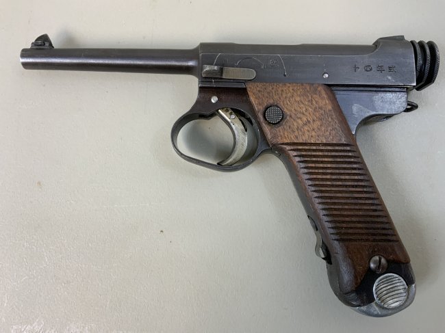 WWII IMPERIAL JAPANESE TYPE 14 NAMBU PISTOL 1942: World War II Japanese Type 14 Nambu Pistol, made in August of 1942 (17.8 stamp) at the Nagoya Arsenal . This pistol is a fantastic original example of what a Japanese soldier would have used during Wo