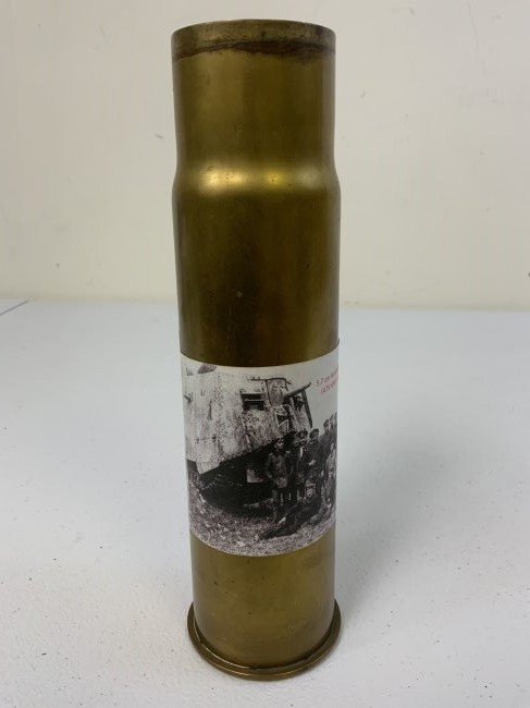 ANTIQUE WWI IMPERIAL GERMANY A7V GERMAN TANK 57MM MAIN GUN BRASS ROUND SHELL: ANTIQUE WWI IMPERIAL GERMANY A7V GERMAN TANK 57MM MAIN GUN BRASS ROUND SHELL . VERY RARE FIND. 10" TALL APROX 2 3/4 DIAM. GREAT DISPLAT PIECE . MARKED ON THE BOTTOM . COMES WITH WWI TANK AND CREW PICT