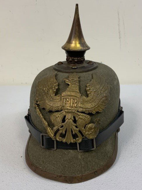WWI PRUSSIAN IMPERIAL GERMAN PICKELHAUBE ERZATZ WARTIME SPIKE HELMET FELT: WWI PRUSSIAN IMPERIAL GERMAN PICKELHAUBE ERZATZ WARTIME SPIKE HELMET. FELT BODY WITH BRASS WARTIME FITTINGS. LINING IS THERE BUT FALLING OUT AND NEEDS TO BE SECURED . RARE HELMET .
