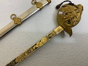 IMPERIAL GERMANY MINIATURE PRESENTATION SWORD WITH ENGRAVED GILDED BLADE