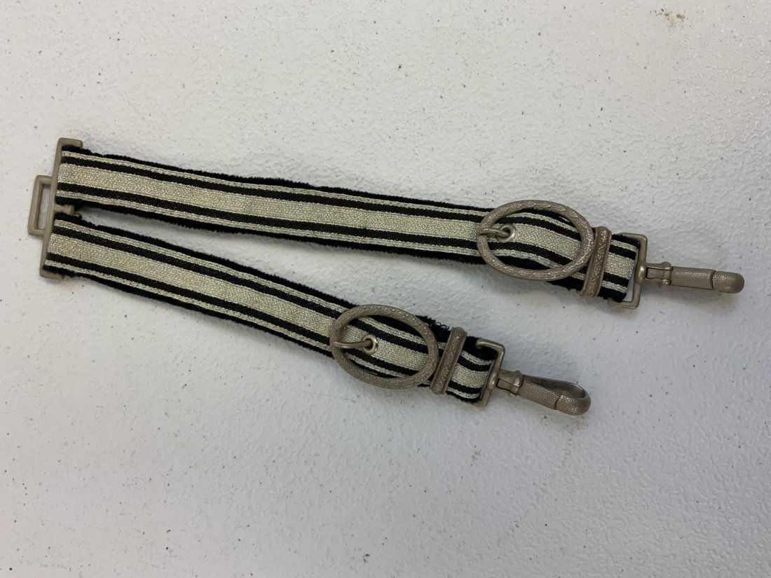 WWII GERMAN RAILWAY OFFICIAL DAGGER HANGERS: WWII GERMAN RAILWAY OFFICIAL DAGGER HANGERS . RARE SET. JUST LIKE ARMY OFFICER BUT WITH BLACK COLOR ON THE STRAPS . GREAT CONDITION .