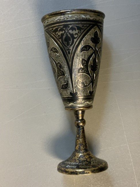 ANTIQUE RUSSIAN CAUCASIAN SILVER NIELO WINE CUP CHALICE: ANTIQUE RUSSIAN CAUCASIAN SILVER NIELLO WINE CUP CHALICE . SILVER HALLMARKS AT THE BOTTOM. LATER DEDICATION TO THE PERSON WHO FINISHED SCHOOL IN 1983 ENGRAVED . 4" TALL