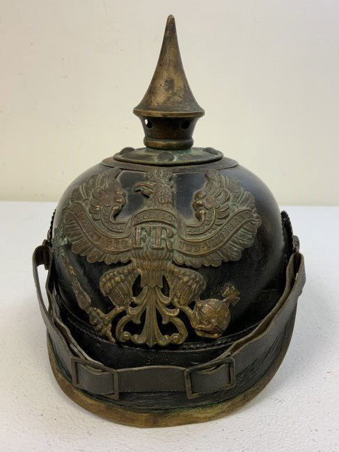 WWI PRUSSIAN IMPERIAL GERMAN PICKELHAUBE SPIKE HELMET: WWI PRUSSIAN IMPERIAL GERMAN PICKELHAUBE SPIKE HELMET. VERY GOOD CONDITION FOR ITS AGE. BRASS FITTINGS . COMPLETE WITH LINER AND CHINSTRAP. GOOD EXAMPLE.
