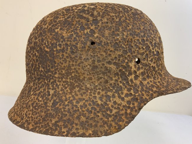 WWII GERMAN M42 COMBAT RUSSIAN FRONT HELMET STALINGRAD AREA FIND: WWII GERMAN M42 COMBAT RUSSIAN FRONT HELMET STALINGRAD AREA FIND . STILL SOLID COMPLETE WITH LINER . RECOVERED IN VOLGOGRAD (STALINGRAD) RUSSIA. REMNANTS OF WHITE WINTER CAMOUFLAGE PAINT.