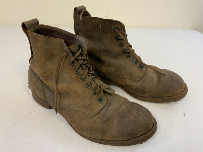 WWII GERMAN MILITARY BROWN LEATHER M37 FIELD LOW BOOTS WITH HOBNAILS: WWII GERMAN MILITARY BROWN LEATHER M37 FIELD LOW BOOTS WITH HOBNAILS. WELL USED CONDITION. SHOWS MUCH WEAR AND AGE. COMPLETE WITH LASES . RARE.