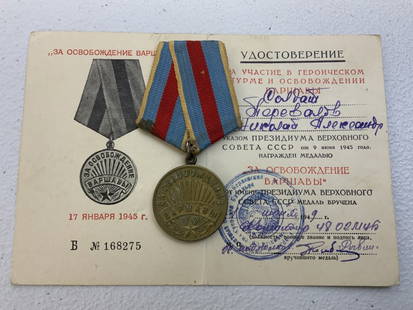 USSR SOVIET RUSSIA WWII LIBERATION OF WARSAW MEDAL WITH ISSUE DOCUMENT: USSR SOVIET RUSSIA WWII LIBERATION OF WARSAW MEDAL WITH ISSUE DOCUMENT .