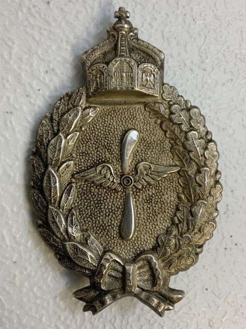 GERMANY WWI COMMEMORATIVE PRUSSIAN FLYERS BADGE: GERMANY WWI COMMEMORATIVE PRUSSIAN FLYERS BADGE. POST WAR PRODUCED BADGE BY C.E.JUNKER. MULTI PIECE CONSTRUCTION . MARKED " C.E.JUNKER BERLIN 800" ON THE BACK.