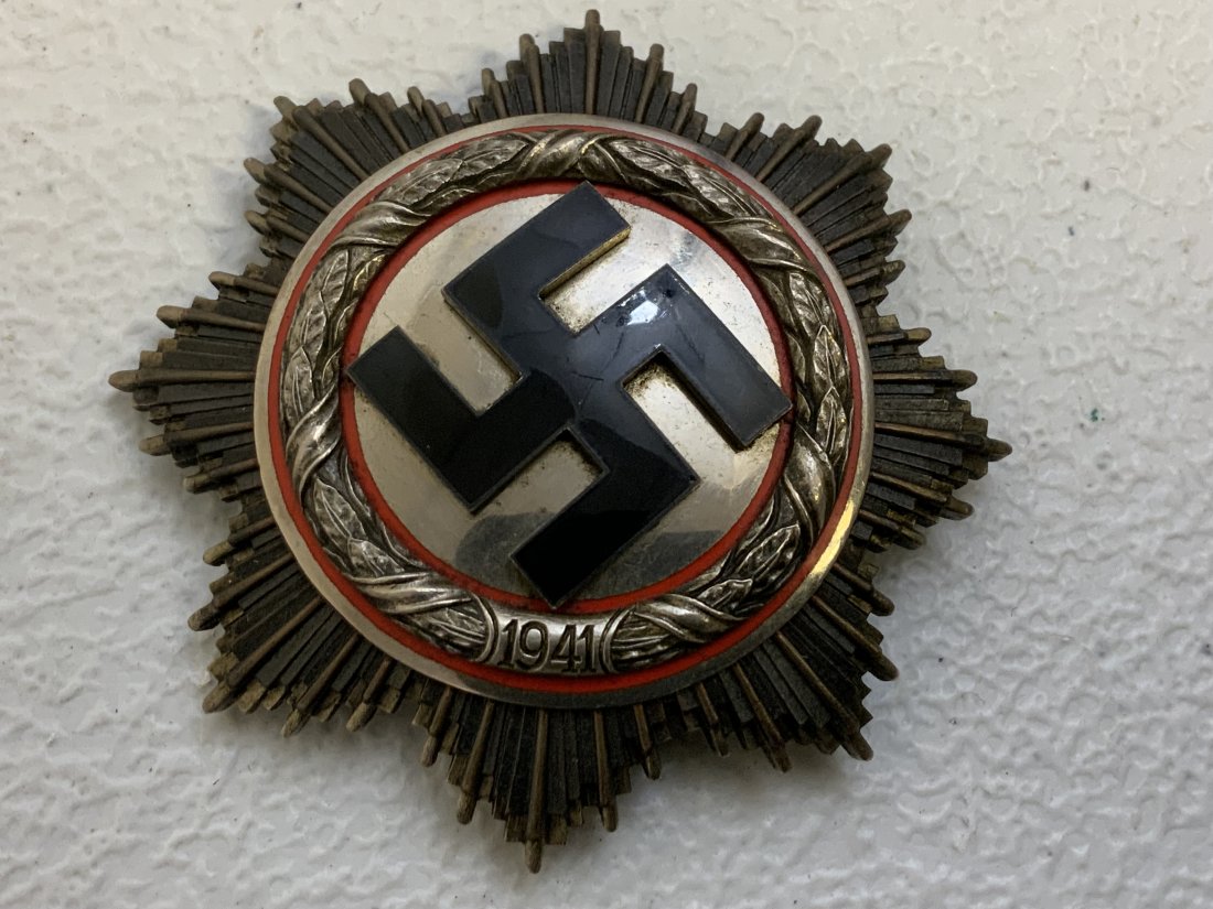 WWII NAZI GERMANY 1941 GERMAN CROSS IN SILVER: WWII NAZI GERMANY 1941 GERMAN CROSS IN SILVER . MARKED 20 ON THE PIN. 6 RIVET CONSTRUCTION. GREAT CONDITION OVERALL WITH NORMAN WEAR AND AGE.