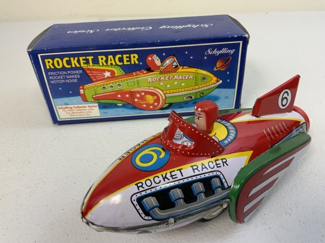 SCHULLING ROCKET RACER TIN TOY COLLECTORS MODEL IN THE BOX: SCHULLING ROCKET RACER TIN TOY COLLECTORS MODEL IN THE BOX . FRICTION MOTOR. NEW CONDITION . COMES WITH ORIGINAL BOX. 7 1/2" LONG