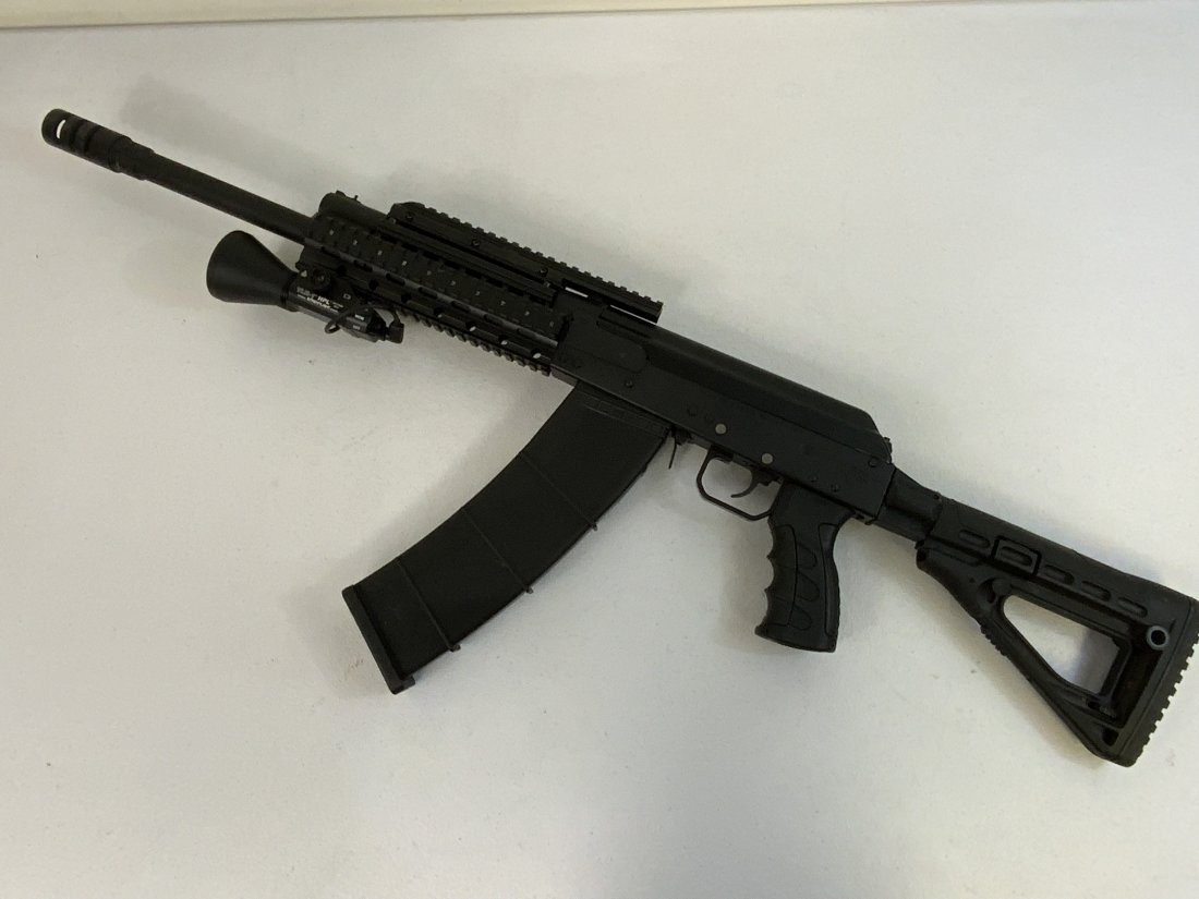 RUSSIAN SAIGA 12 IZHMASH MADE 12GA SHOTGUN: Made in Russia 12 ga AK style shotgun, comes with TLR Streamlight quad rail and high capacity magazine. In good used condition. FFL required. No shipping outside USA .