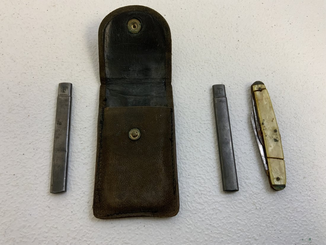 VINTAGE WWII US MILITARY POCKET KNIFE , PENCIL AND NAIL FILE IN CASE.: VINTAGE WWII US MILITARY POCKET KNIFE , PENCIL AND NAIL FILE IN CASE. PENCIL AND FILE ARE IN STIRLING SILVER CASES. MOTHER OF PEARL POCKET KNIFE GRIP HAS CRACKS. LEATHER POUCH WITH SNAP BUTTON. APPROX