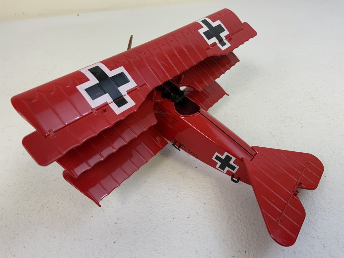 THE RED BARONS FOKKER DR.1. TRIPLANE DISPLAY MODEL: THE RED BARONS FOKKER DR.1. TRIPLANE DISPLAY MODEL . NICE DETAILED MODEL . 7" LONG WITH 9" WING SPAN AND ABOUT 4" HIGH. GREAT DISPLAY PIECE.