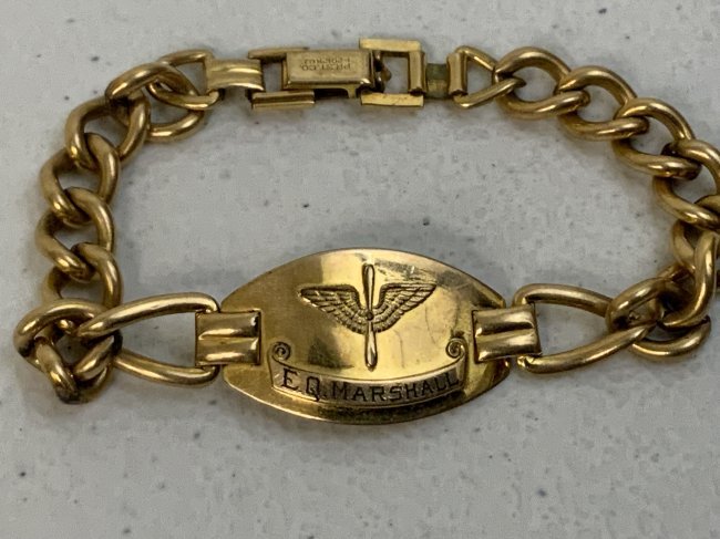 US AIR FORCE WWII GILD PLATED BRACELET NAMED TO E.Q.MARSHALL: US AIR FORCE WWII GILD PLATED BRACELET NAMED TO E.Q.MARSHALL . 7" LONG.