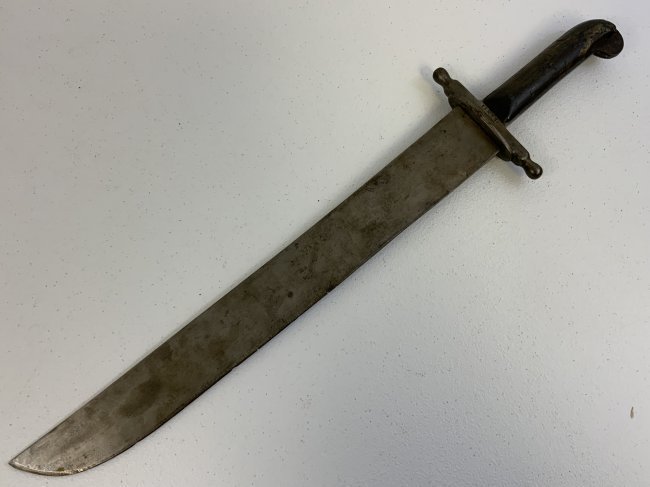 ANTIQUE AUSTRIAN M 1848 ARTILLERY SHORT SWORD: ANTIQUE AUSTRIAN M 1848 ARTILLERY SHORT SWORD . GOOD CONDITION FOR ITS AGE. NICELY MARKED WITH REGIMENTAL STAMPS AND 1858 DATE. CHIP TO A WOOD GRIP ON ONE SIDE. MASSIVE WIDE BLADE IS 18" LONG AND 2" W