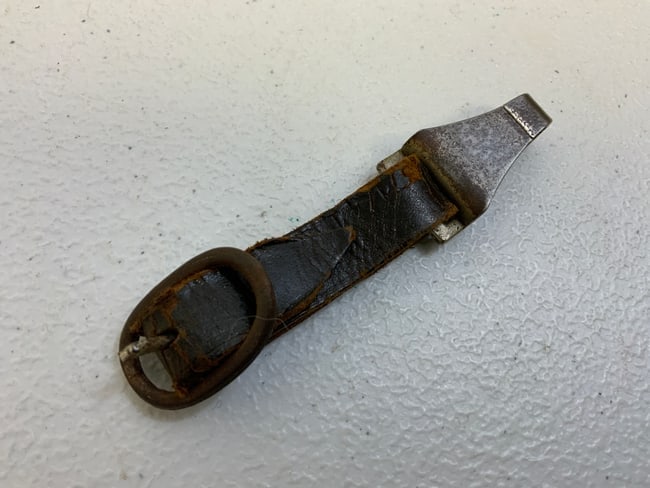 WWII GERMAN SA DAGGER HANGER RZM MARKED: WWII GERMAN SA DAGGER HANGER . RZM MARKED ON THE LEATHER AND THE CLIP. WELL USED BUT STILL GOOD CONDITION .