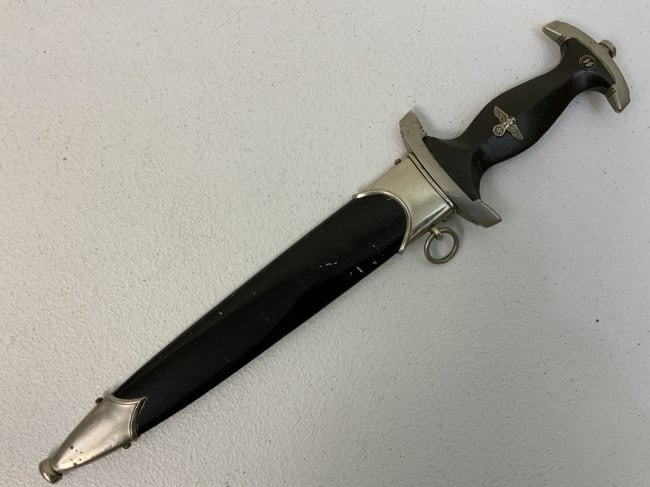 NAZI GERMANY M33 SS DAGGER GROUND ROHM: RARE NAZI GERMAN EARLY M33 SS DAGGER GROUND ROHM BLADE. GREAT CONDITION OVERALL WITH NICE BRIGHT BLADE WITH DEEPLY ETCHED MOTTO . REVERSE HAS BEEN GROUNDED TO REMOVE THE ROHM DEDICATION . GOOD NICKEL