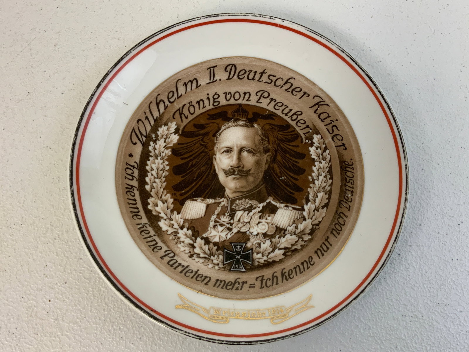 ANTIQUE IMPERIAL GERMANY WWI 1914 PATRIOTIC PORCELAIN PLATE: ANTIQUE IMPERIAL GERMANY WWI 1914 PATRIOTIC PORCELAIN PLATE . NICE ARTWORK. 8" DIAM.