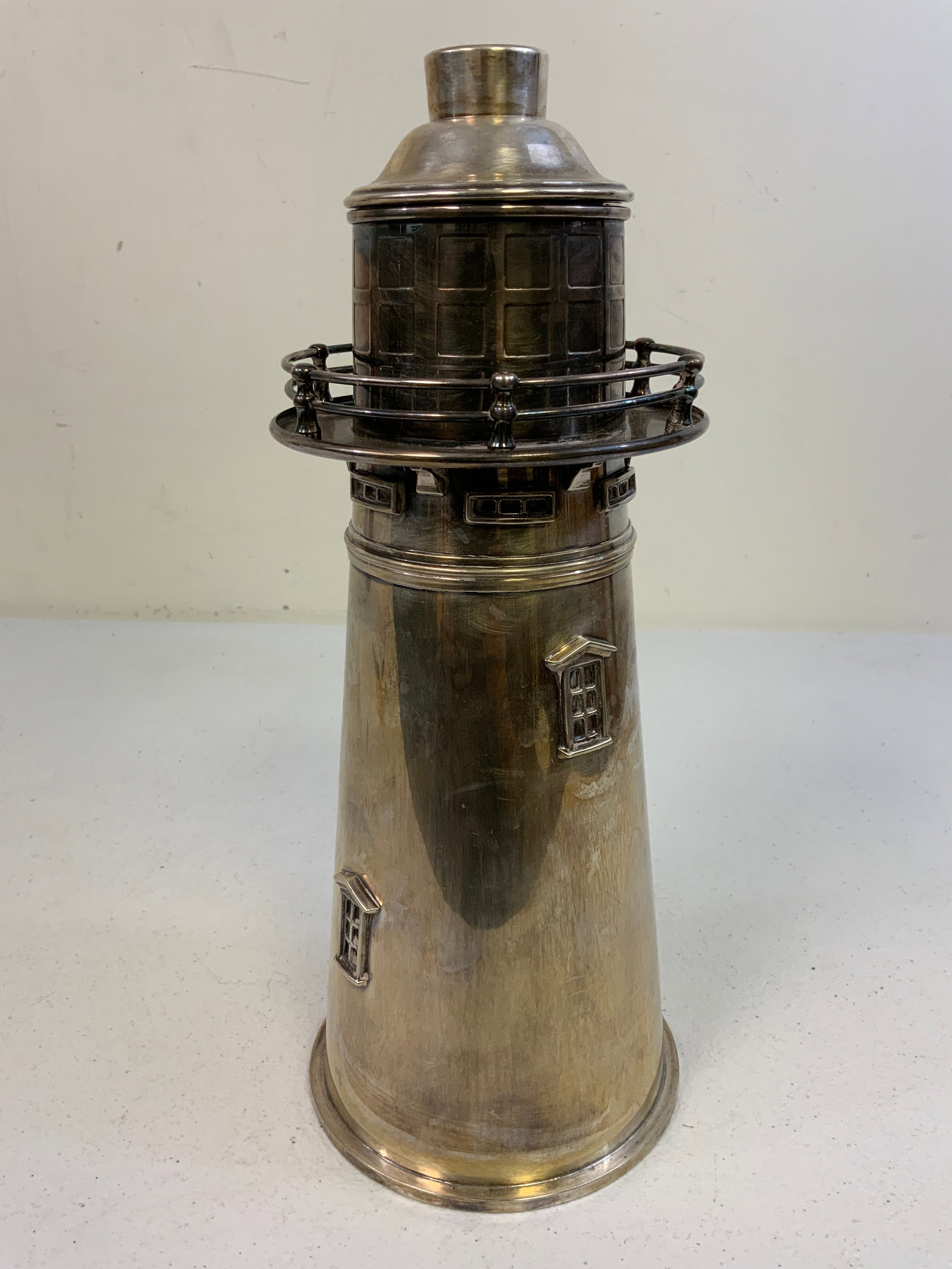 SHEFFIELD LIGHTHOUSE COCKTAIL SHAKER OF BOSTON LIGHTHOUSE - SILVERPLATE: SHEFFIELD LIGHTHOUSE COCKTAIL SHAKER OF BOSTON LIGHTHOUSE - SILVERPLATE. Boston Lighthouse Cocktail Shaker. Heavily constructed of silver plated brass, then lacquered so no polishing is required. This