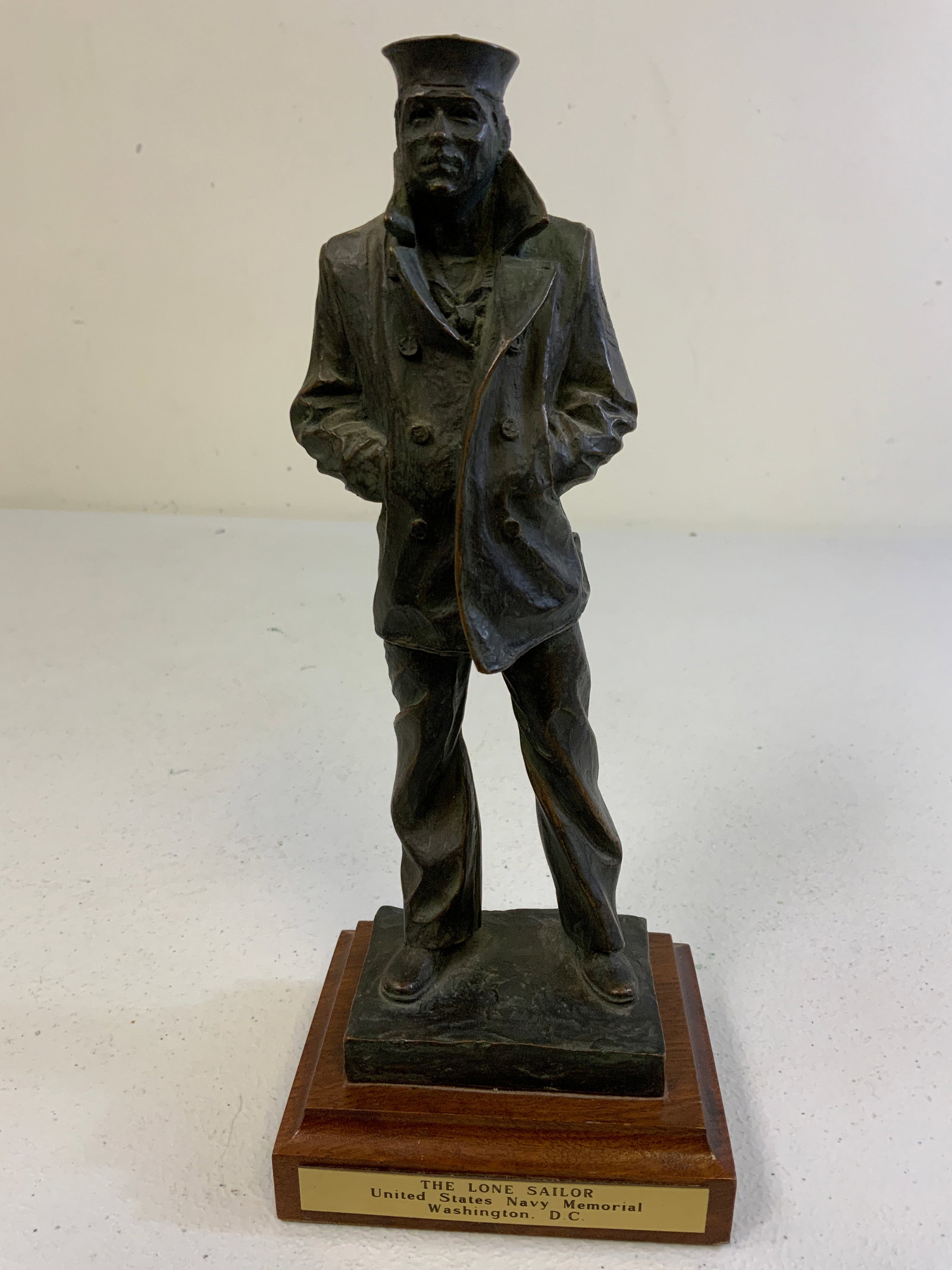 THE LONE SAILOR USN MEMORIAL BRONZE STATUE: "THE LONE SAILOR" USN MEMORIAL WASHINGTON DC BRONZE STATUE . 10" TALL ON 4 X 3 1/4 BASE. SIGNED ON THE BACK.