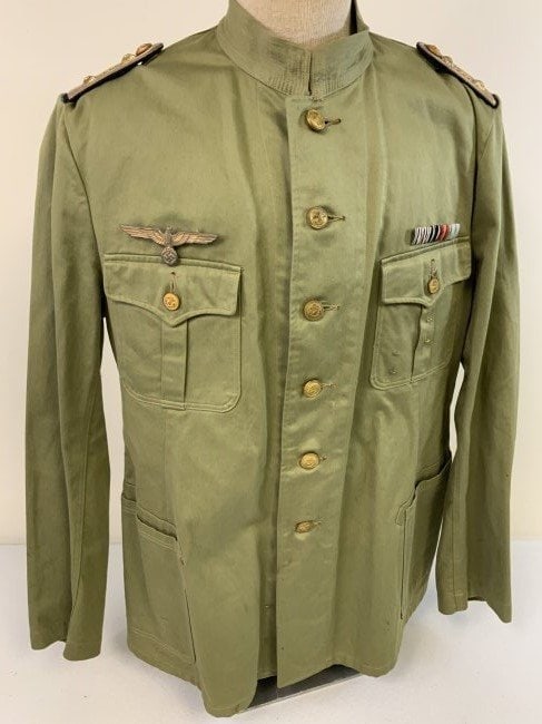 WWII GERMAN NAVY KRIEGSMARINE U-BOAT DOCTOR MEDIC CANVAS UNIFORM TUNIC: WWII GERMAN NAVY KRIEGSMARINE U-BOAT DOCTOR MEDIC CANVAS UNIFORM TUNIC . THIS IS VERY RARE EXAMPLE. CUT JUST LIKE THE LEATHER VERSION WITH STAND UP COLOR . REMOVABLE BUTTONS , MEDICAL OFFICER BOARDS A