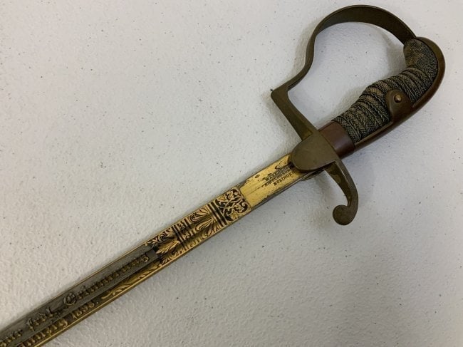 IMPERIAL GERMANY DAMASCUS BLADE OFFICER PRESENTATION SWORD 1898: IMPERIAL GERMANY DAMASCUS BLADE OFFICER PRESENTATION SWORD , BEAUTIFUL DAMASCUS BLADE WITH GOLD AND BLUE FINISHED ETCHINGS. DEDICATION TO AN OFFICER DATED 1898.BRASS HILT FITTINGS AND NICE GRIP WITH O