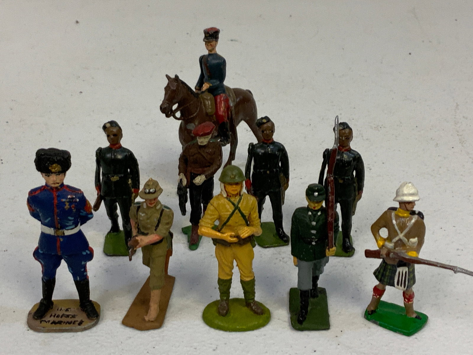LOT OF PAINTED LEAD TOY SOLDIERS: LOT OF PAINTED LEAD TOY SOLDIERS LOT OF 10 . 2" TALL.