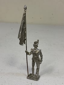UNPAINTED  LEAD TOY SOLDIER WITH FLAG