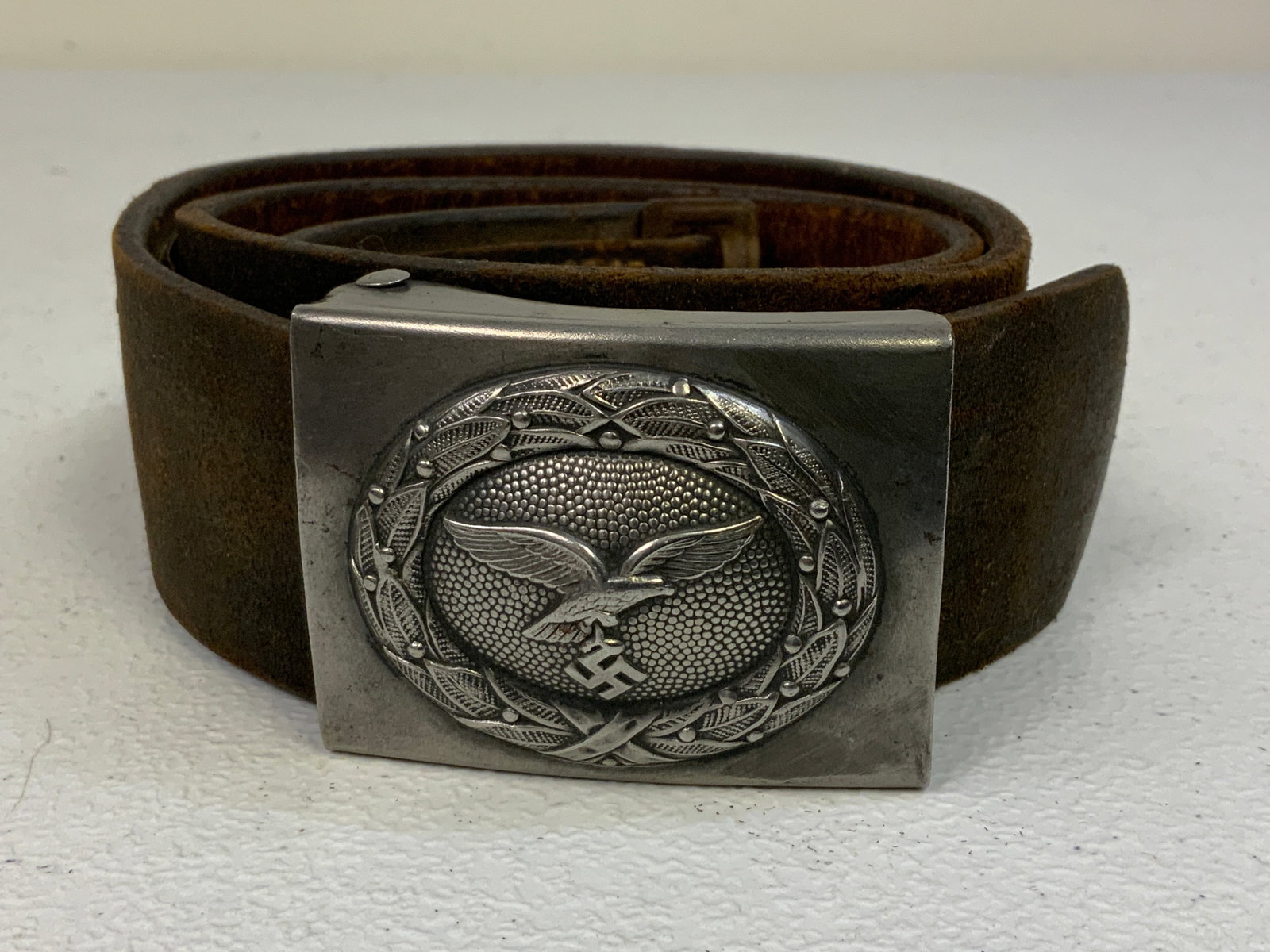 WWII NAZI GERMANY LUFTWAFFE BELT WITH BUCKLE: WWII NAZI GERMANY LUFTWAFFE BELT WITH BUCKLE . WELL USED BUT STILL GOOD CONDITION . STEEL BUCKLE .