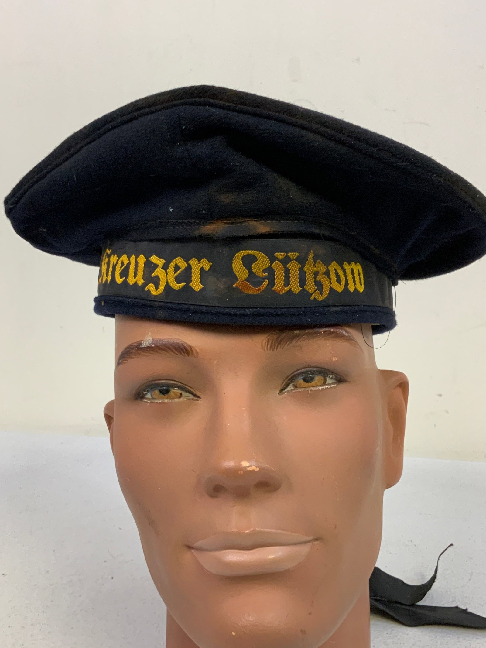 GERMAN SAILOR HAT WITH KREUZER LUTZOW CAP TALLY: GERMAN SAILOR HAT WITH KREUZER LUTZOW CAP TALLY . WELL WORN CONDITION SHOWS AGE AND WEAR . APEARS TO BE A POST WAR CAP WITH WWII TALLY .